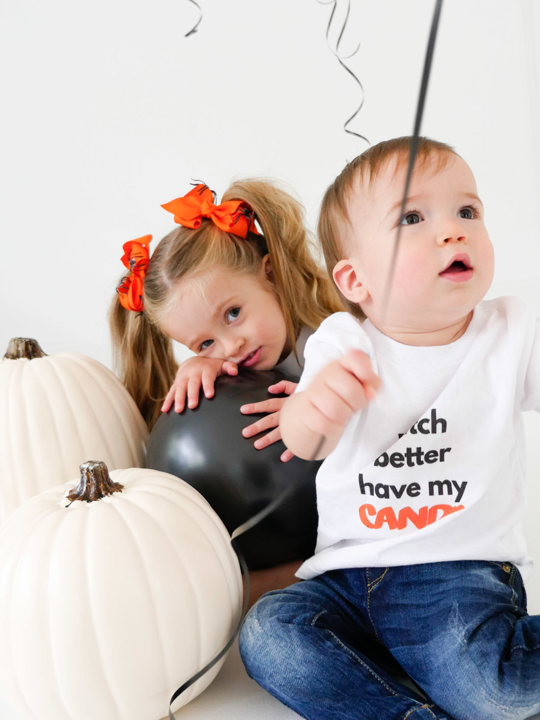 Marlowe and Major Martino wear custom halloween themed tee shirts designed using The Happily App