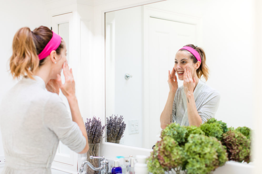 Eva Amurri Martino washes her face in the bathroom of her Connecticut home