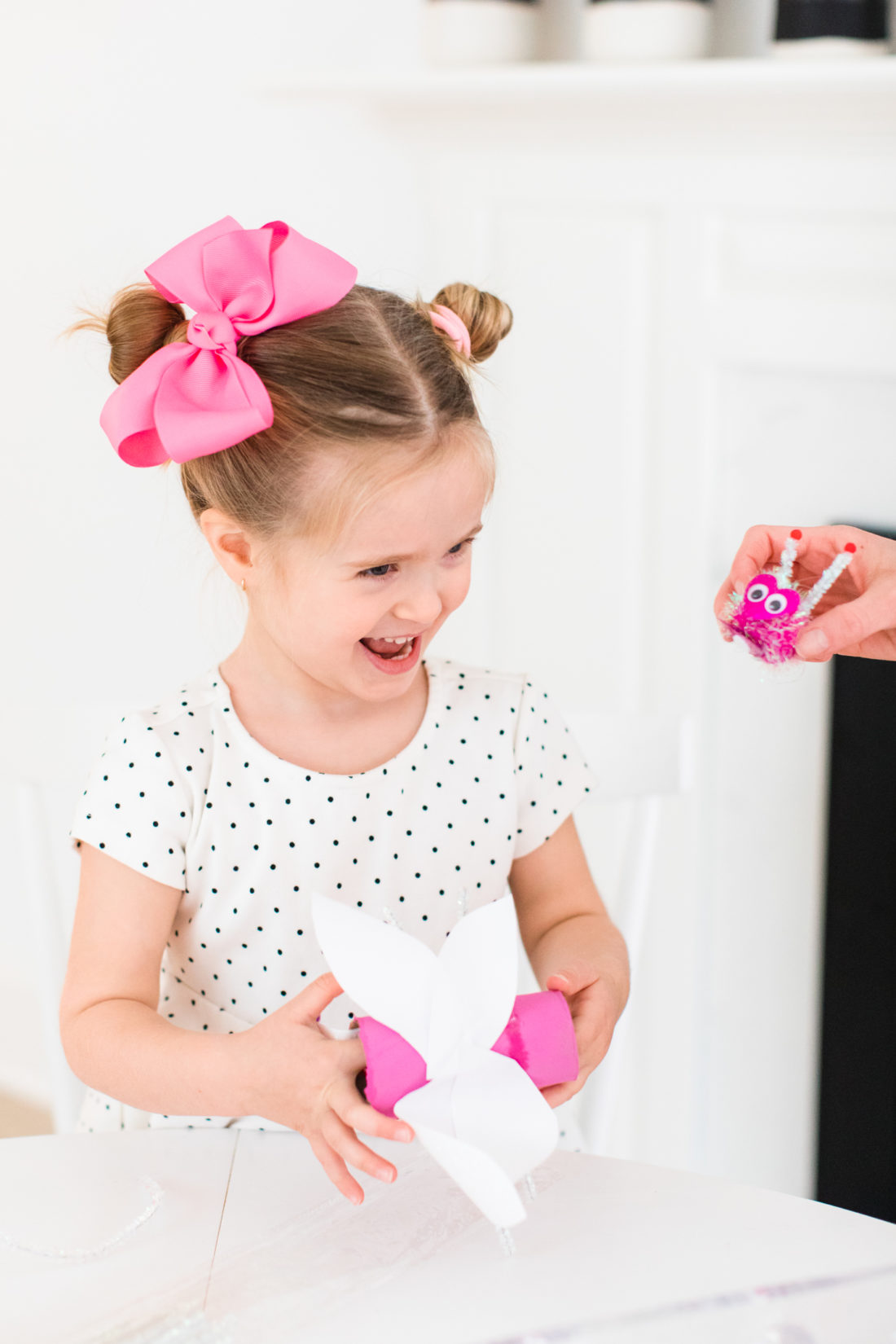 Marlowe Martino has fun crafting DIY Lovebugs for Valentine's Day at her kitchen table