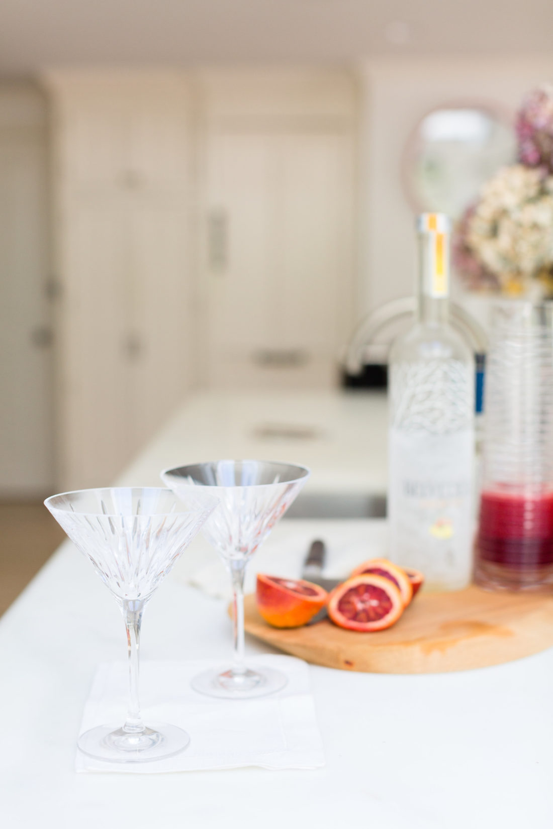 Eva Amurri Martino prepares to make blood orange and ginger martinis in the kitchen of her connecticut home