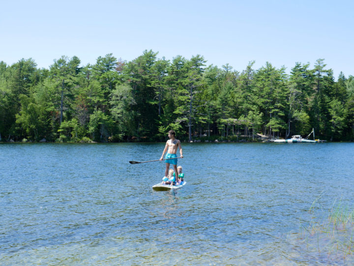 Eva Amurri Martino's husband Kyle takes their kids Marlowe and Major on a stand up paddle board ride in Bar Harbor, ME.