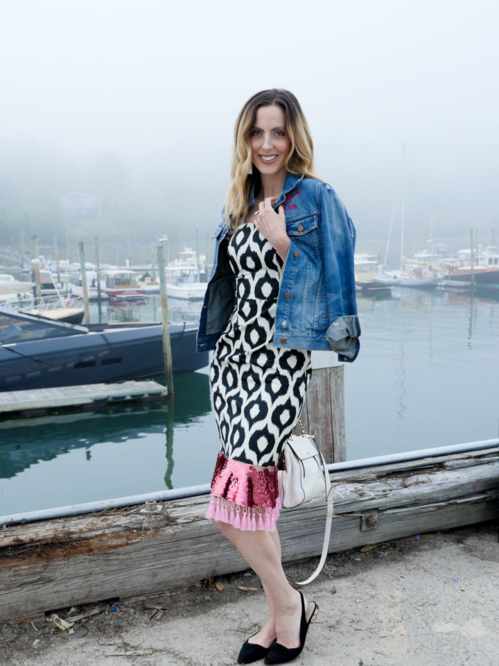 Eva Amurri Martino wears a geometric printed dress with a flare of pink and a denim jacket in Bar Harbor, ME.