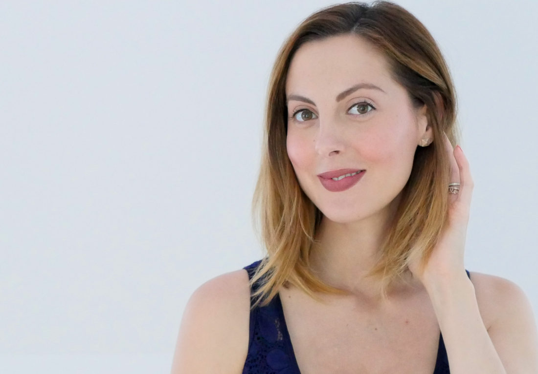 Eva Amurri Martino of Happily Eva After blog wearing a navy blue lace dress and showing off a makeup look created by using the products in her September Beauty Picks roundup