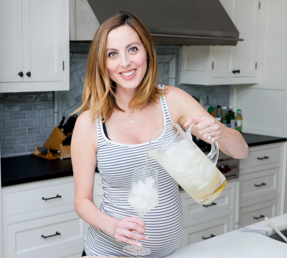 Eva Amurri Martino of lifestyle blog Happily Eva After making a hydrating drink she plans to utilize during her home birth