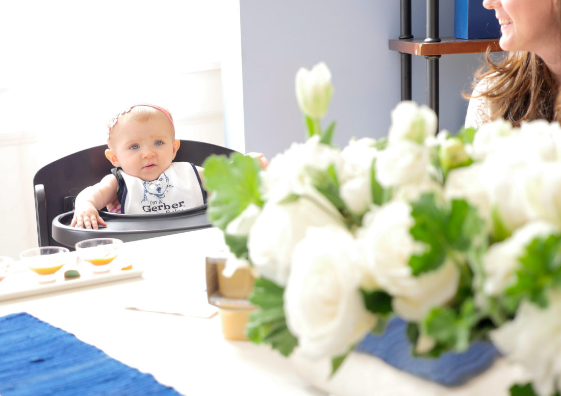 Sitting around the taste testing table at the Gerber Babies event in NYC where a baby tested out new Gerber flavors, as photographed by Eva Amurri Martino for lifestyle blog Happily Eva After