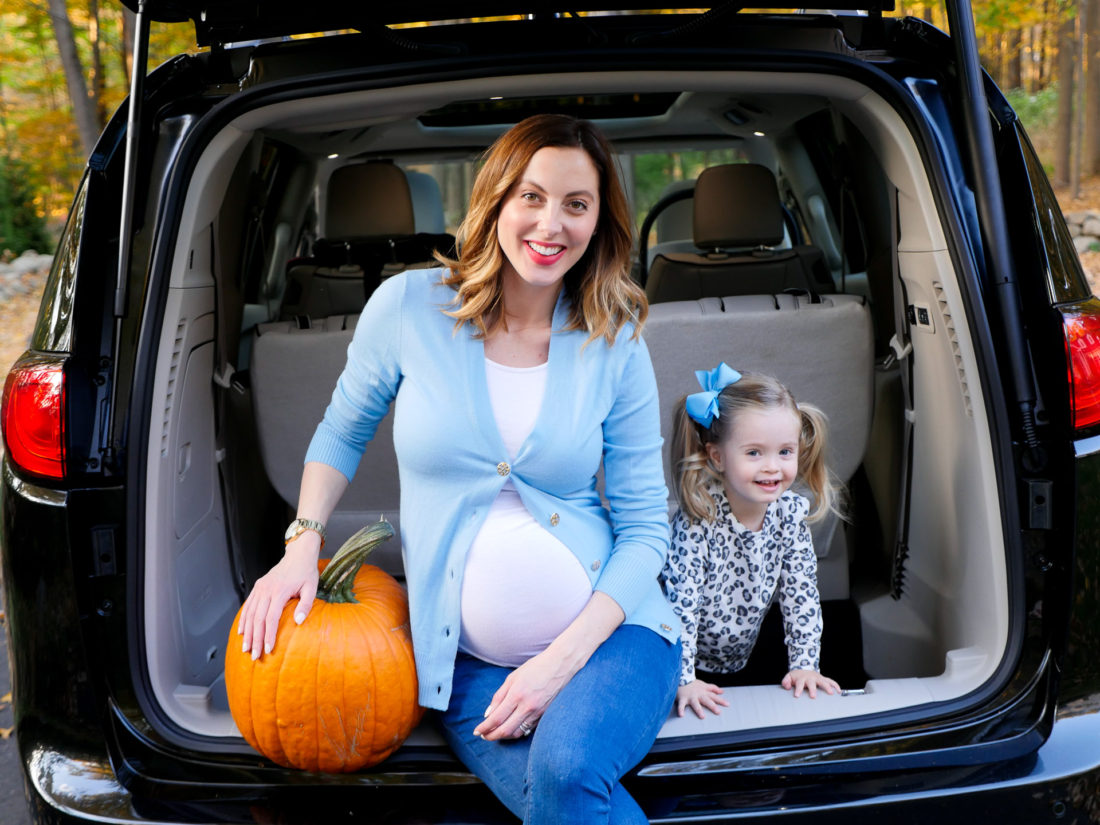 Eva Amurri Martino and Marlowe Martino pictured sitting in the trunk of the chrysler pacifica