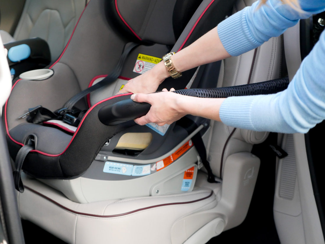 Eva Amurri Martino pictured using the attached vacuum feature on her new chrysler pacifica