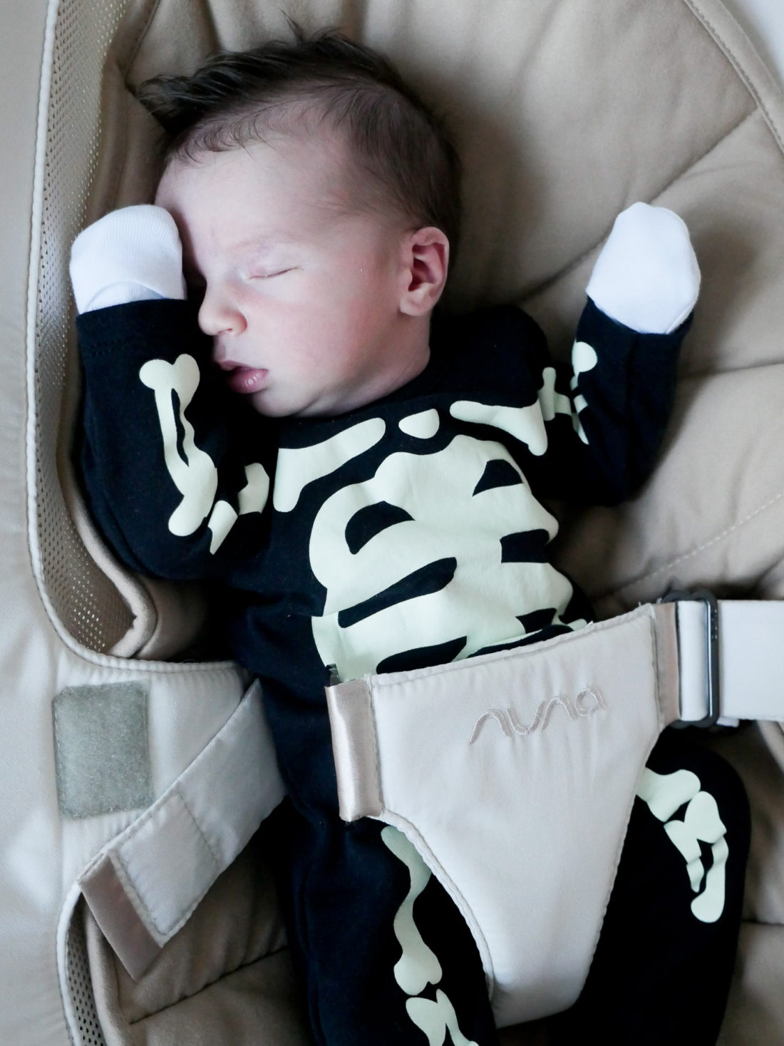 Major Martino, wearing a skeleton Halloween costume at one week old