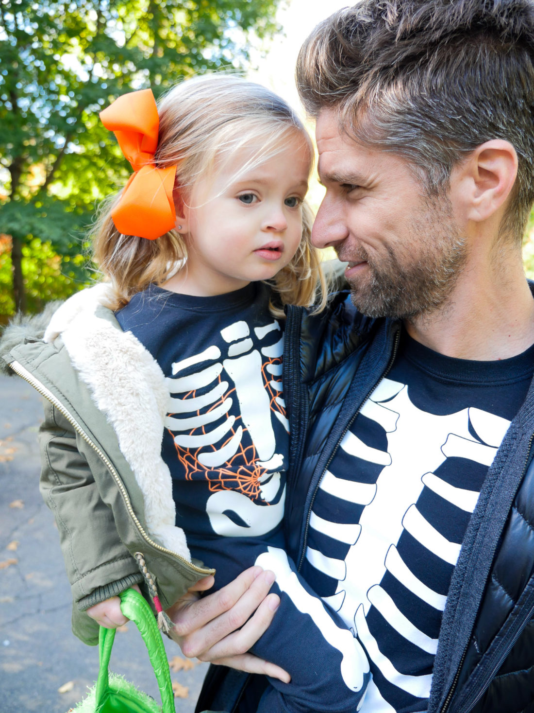 Kyle Martino and Marlowe Martino dressed up as skeletons on halloween