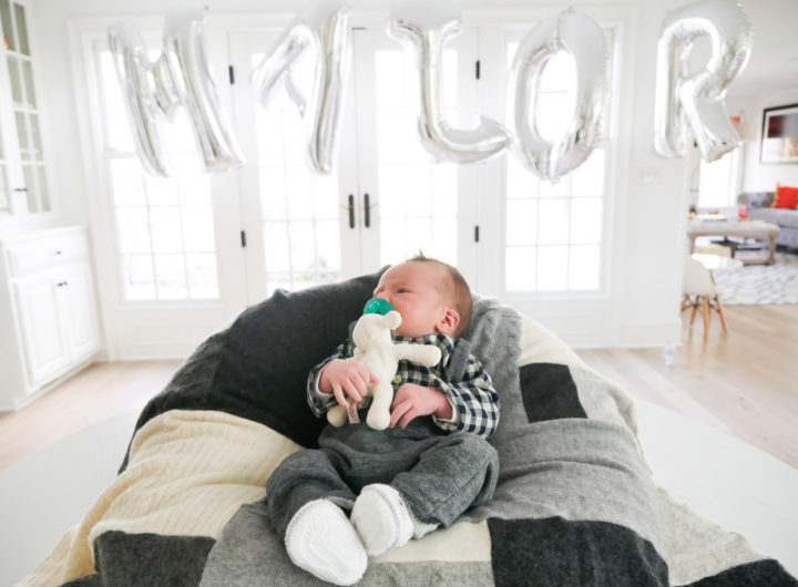 Lifestyle and Motherhood blogger Eva Amurri Martino's newborn son, Major James, is pictured in the foreground with a balloon sign spelling out his name at the Sip And See party in his honor at her connecticut home