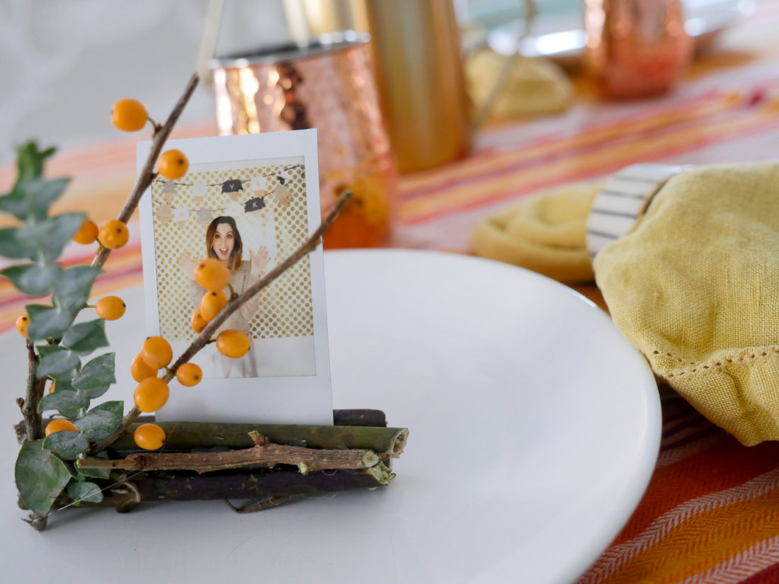 Eva Amurri Martino's fresh and festive Holiday Photo Frame Place card settings using the Instax mini 70