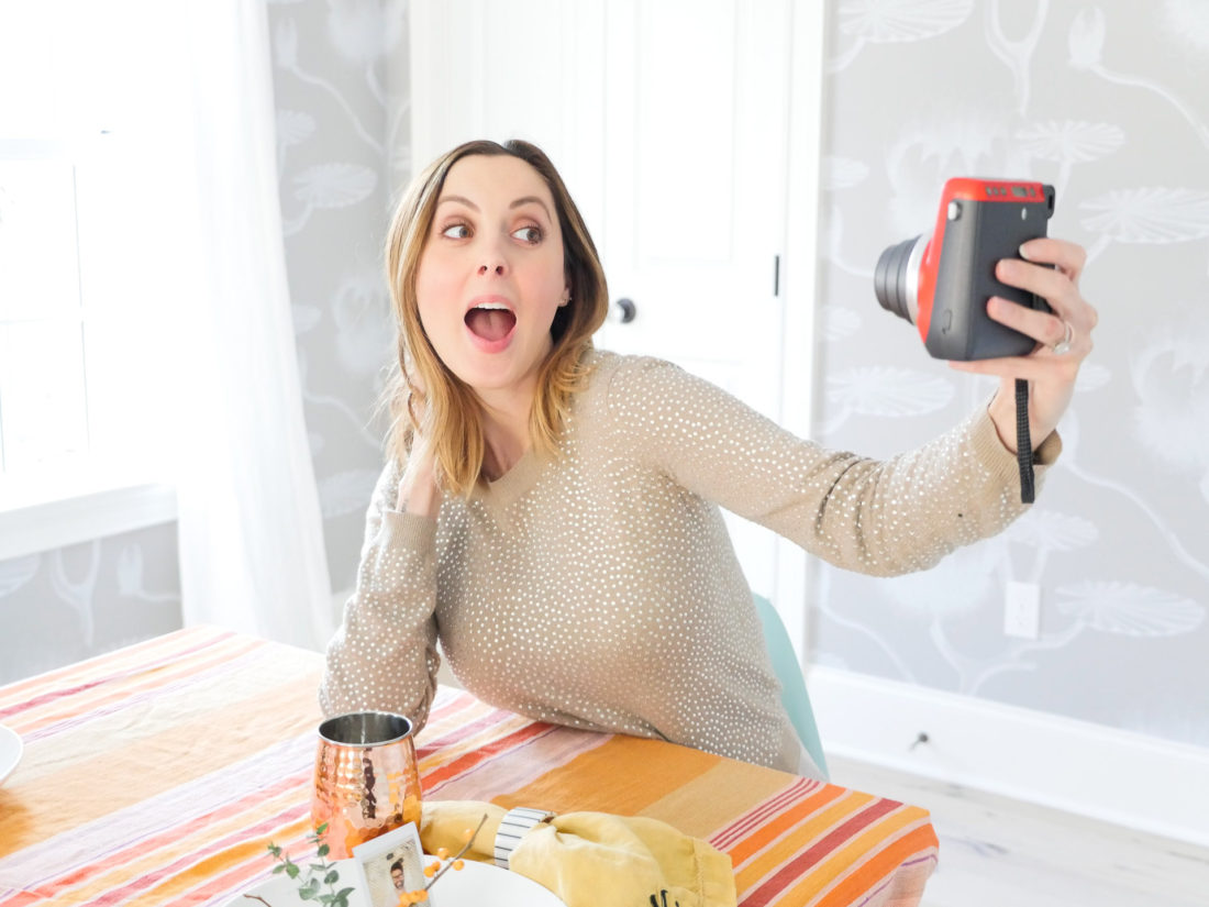 Eva Amurri Martino pictured taking a selfie with her red Instax mini 70 camera