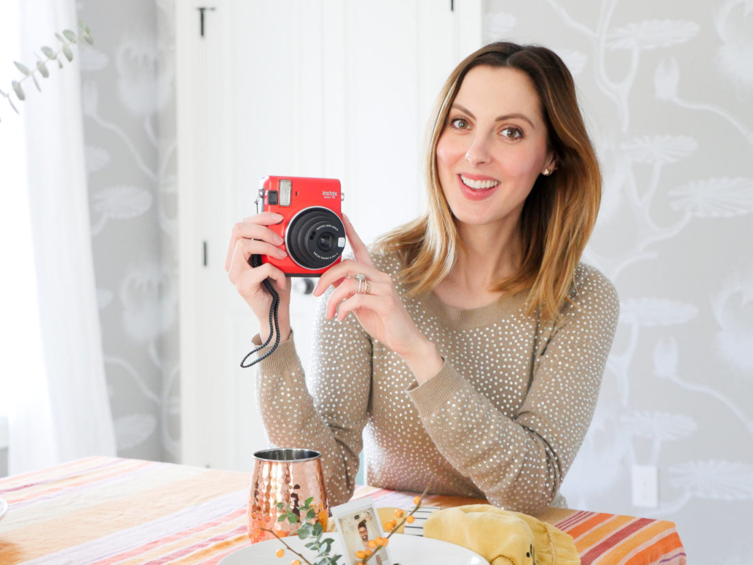 Eva Amurri Martino of lifestyle and Motherhood blog Happily Eva After demonstrates how to create holiday place card settings using the Instax mini 70 camera