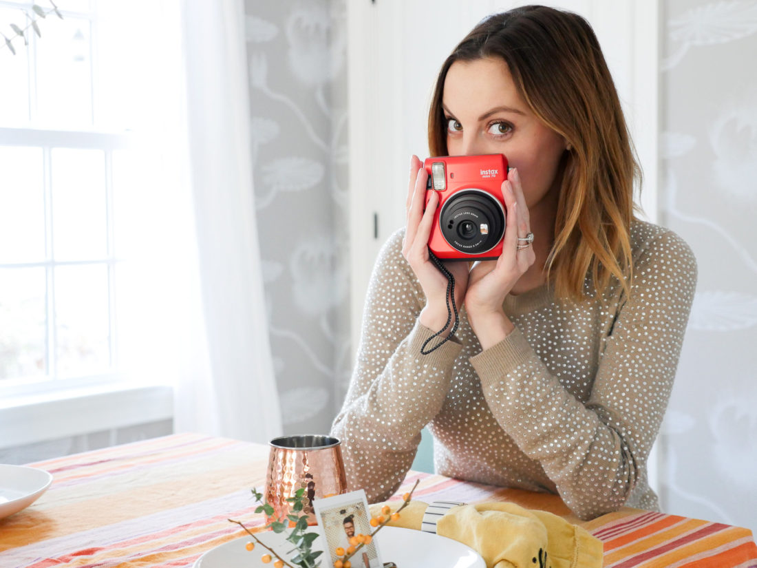 Eva Amurri Martino pictured with her red Instax mini 70 camera