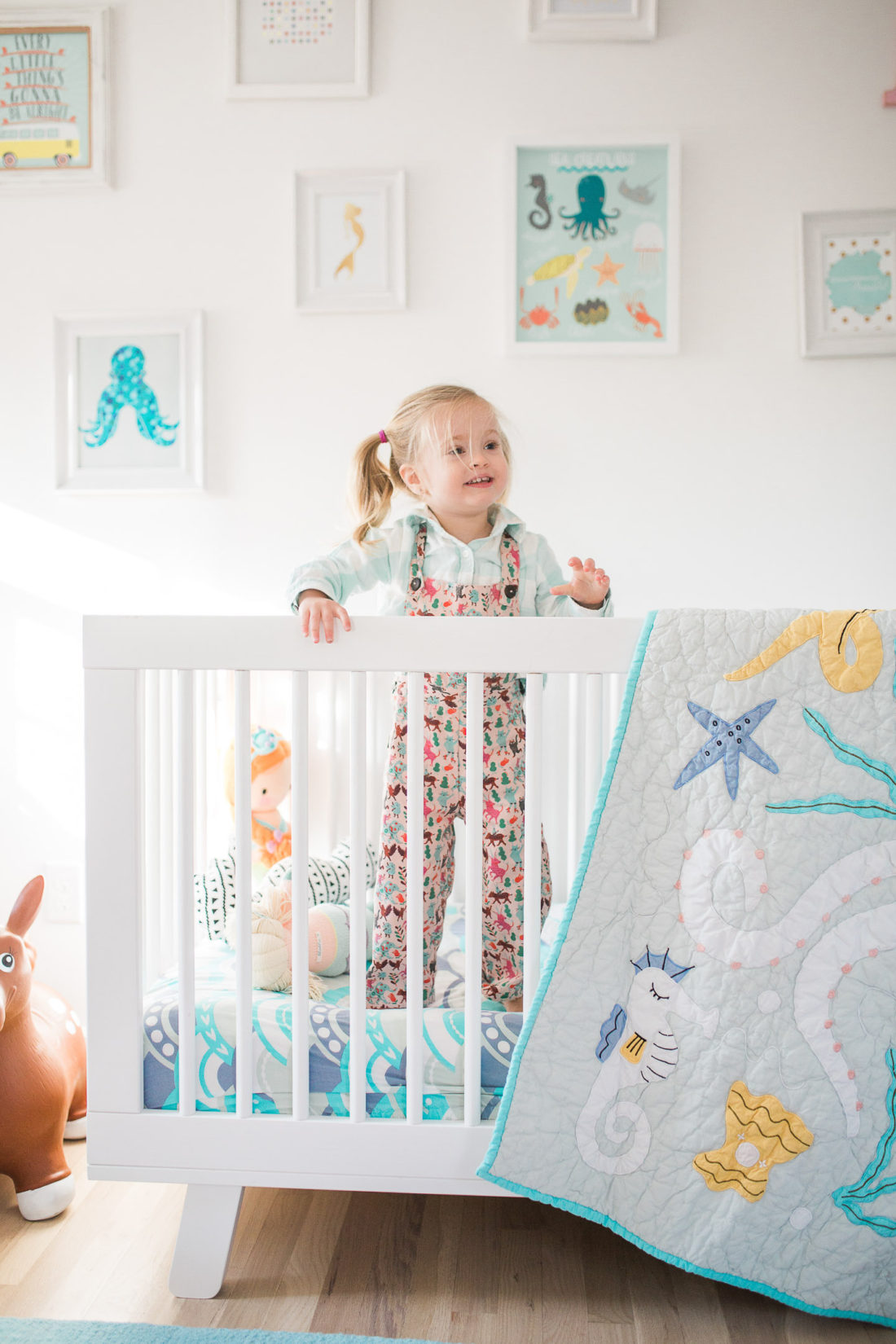 Marlowe Martino pictured in her mermaid inspired bedroom in her home in Connecticut designed by mother Eva Amurri Martino of lifestyle and motherhood blog Happily Eva After