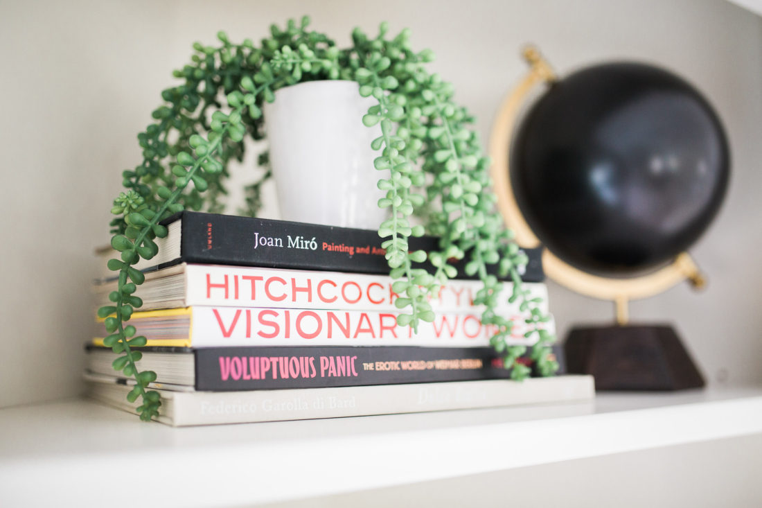 A close up of the shelves in Eva Amurri Martino's black, white, and linen Master Bedroom at her home in Connecticut