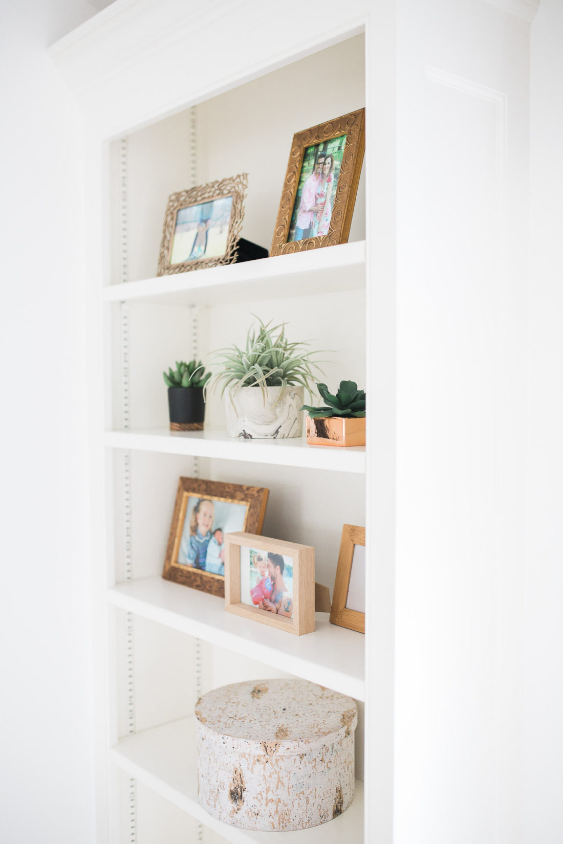 A close up of the shelves in Eva Amurri Martino's black, white, and linen Master Bedroom at her home in Connecticut