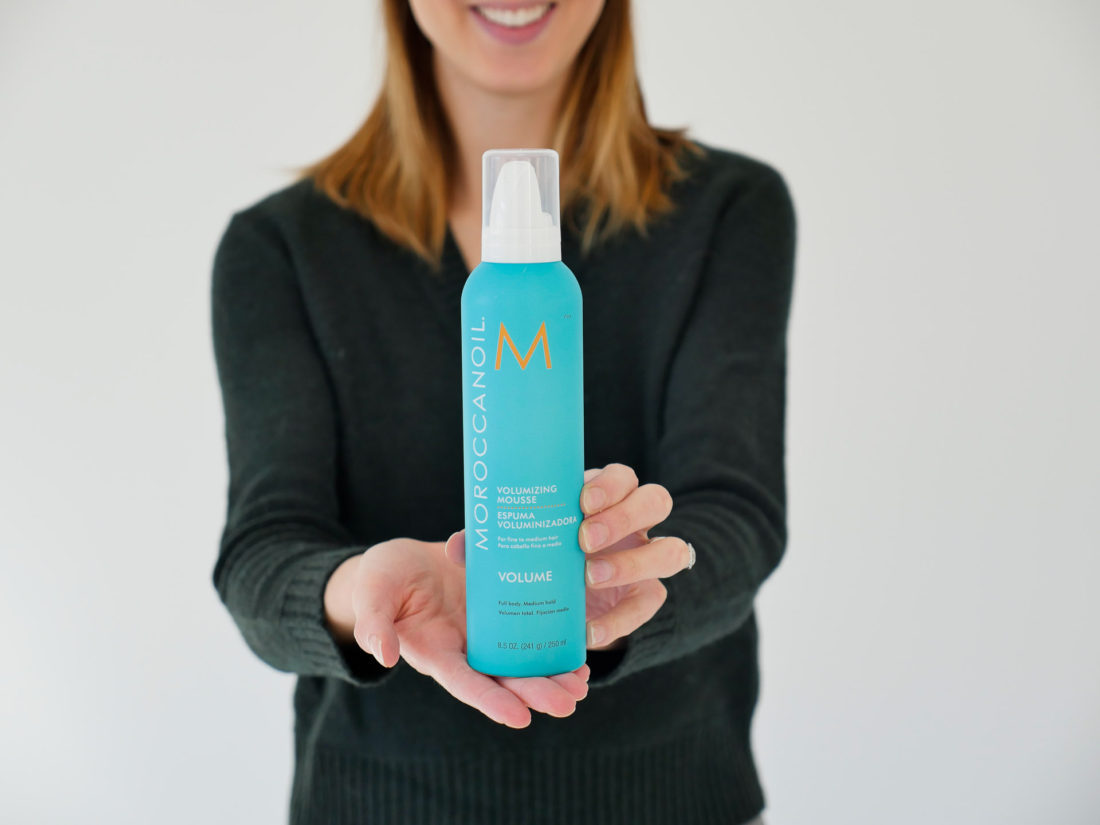 Lifestyle blogger Eva Amurri Martino shows off Morrocan Oil volumizing mousse as one of her beauty picks for December