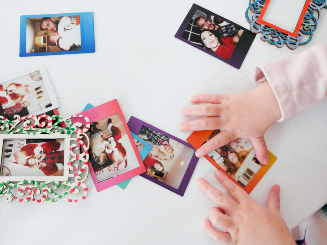 Eva Amurri Martino and two year old daughter Marloweuse plain wooden frames and craft paint to create holiday photo ornaments using the FUJIFILM Instax Mini 70 instant camera