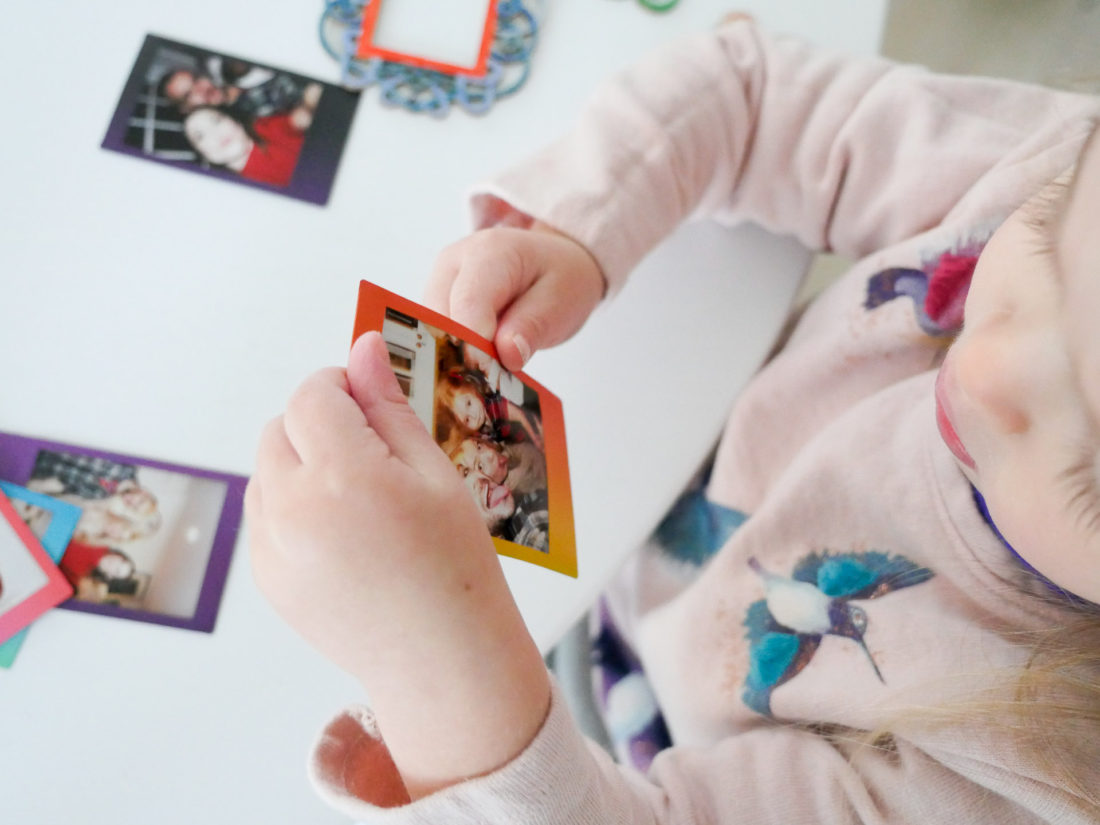 Eva Amurri Martino and two year old daughter Marloweuse plain wooden frames and craft paint to create holiday photo ornaments using the FUJIFILM Instax Mini 70 instant camera