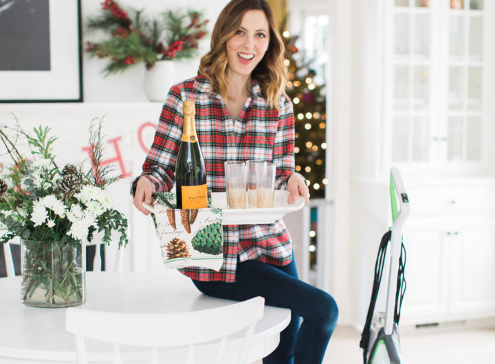 Eva Amurri Martino prepares for a holiday party in her kitchen with a tray of drinks and the bissell crosswave cleaning system