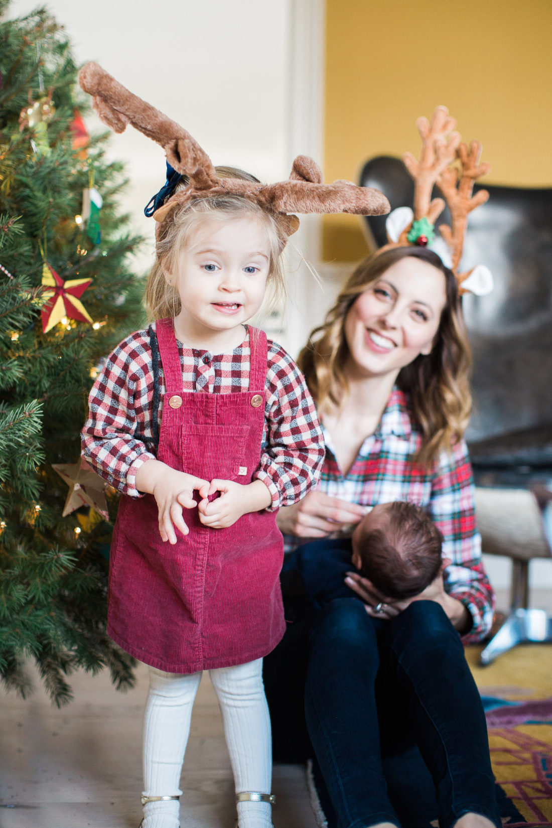 Marlowe Martino decorates the Christmas tree