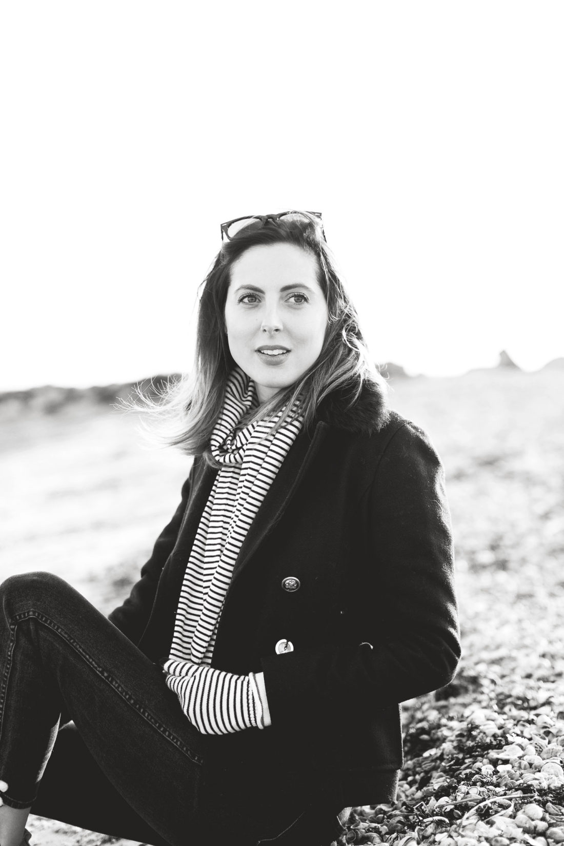 Eva Amurri Martino is bundled up on the sand on the beach in Westport CT in December