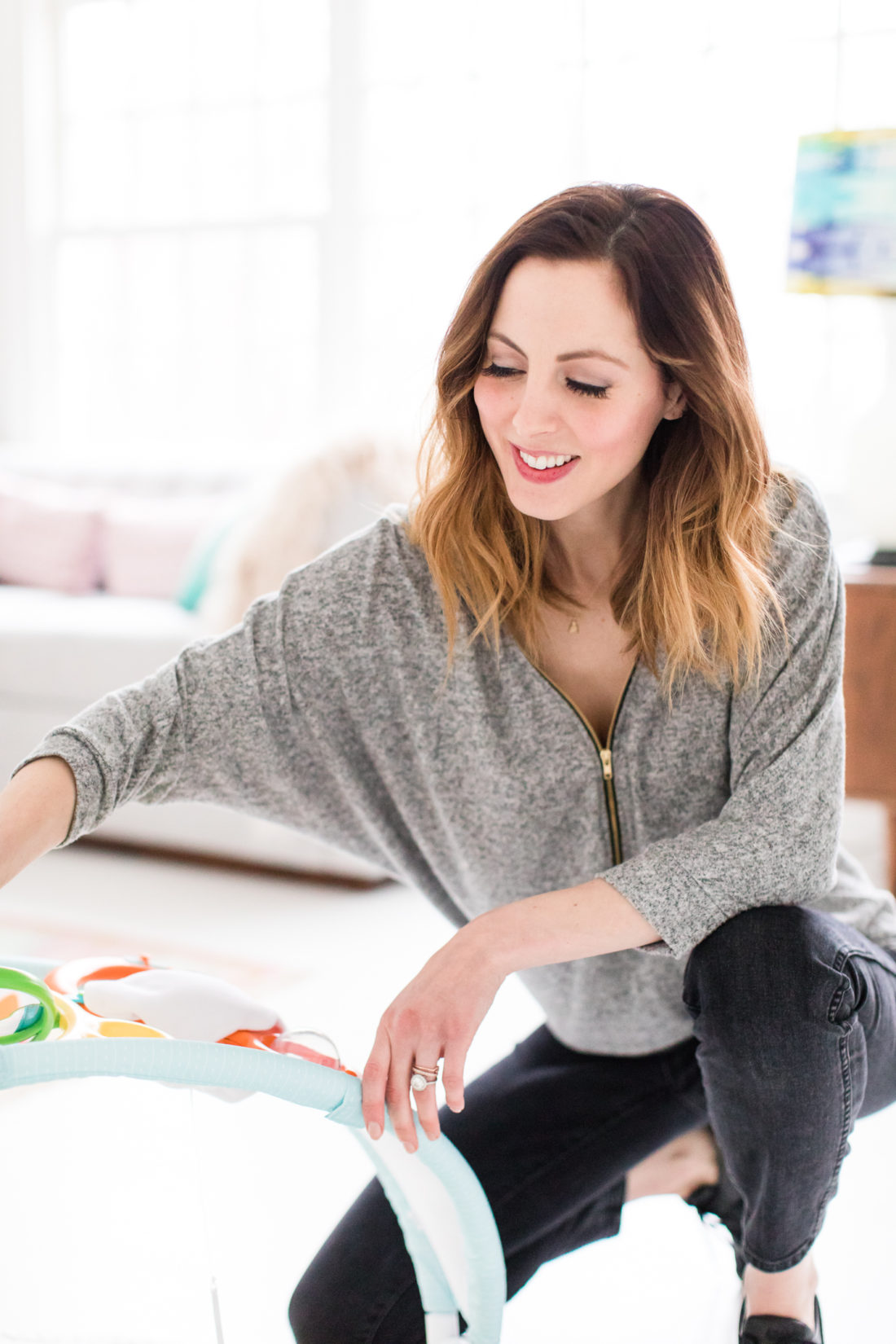 Eva Amurri Martino of lifestyle and Motherhood blog Happily Eva After sets up a play area in her home studio