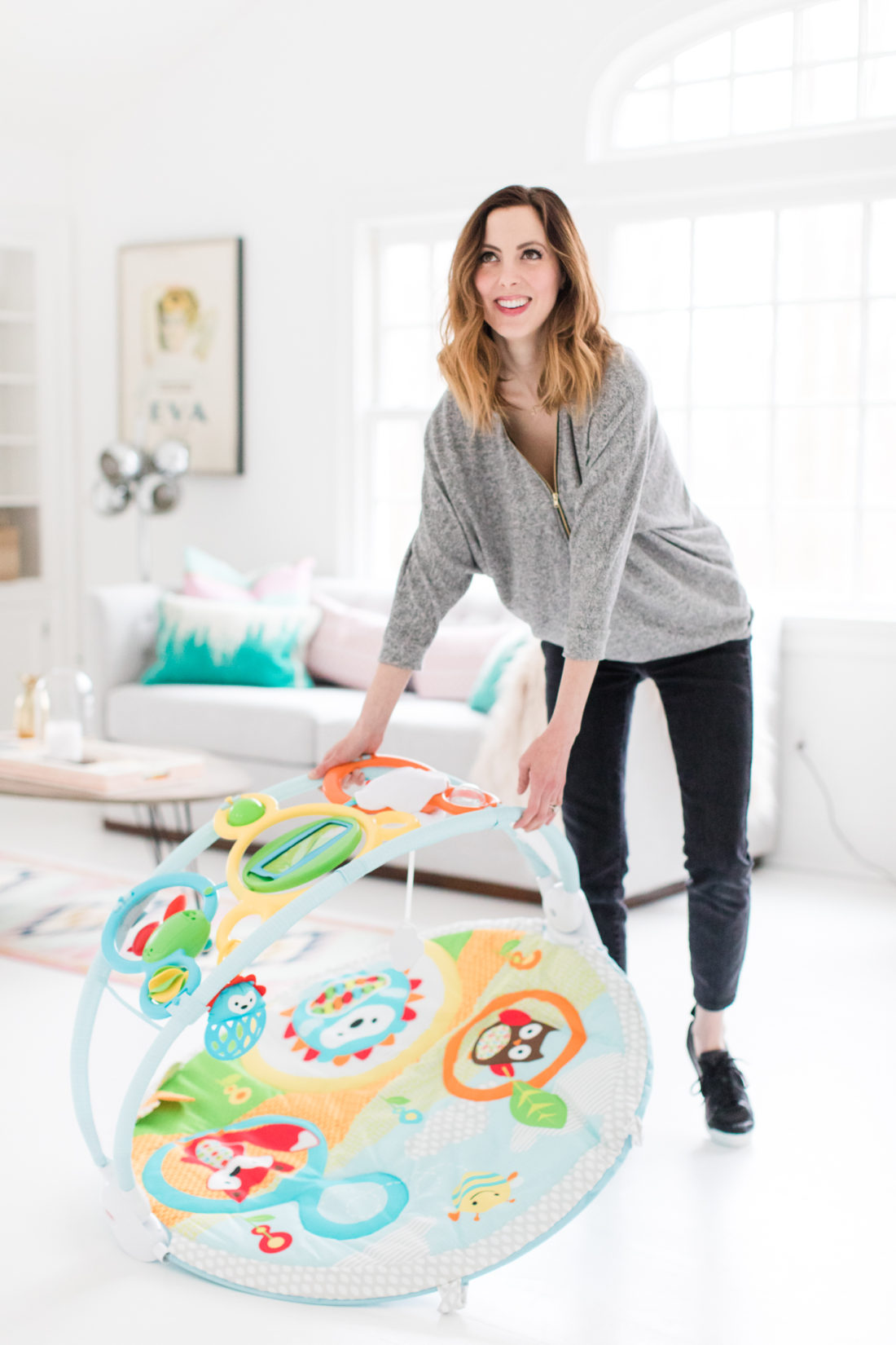 Eva Amurri Martino of lifestyle and Motherhood blog Happily Eva After sets up a play area in her home studio