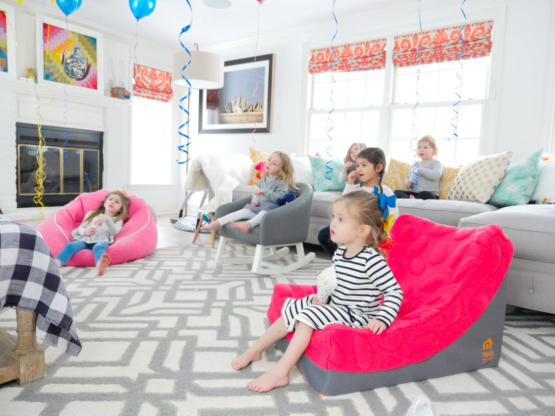 A roomful of little girls pull up a chair to watch the Season Premiere of Ruff-Ruff, Tweet and Dave