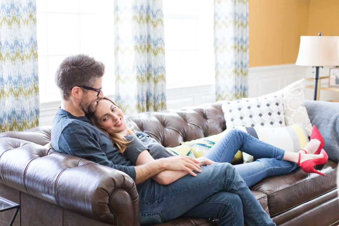 Eva Amurri Martino and Kyle Martino embrace on the couch of their Connecticut home