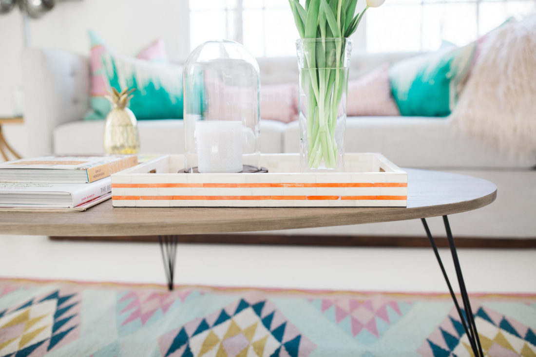 A wood and metal coffee table in the Happily Eva After studio