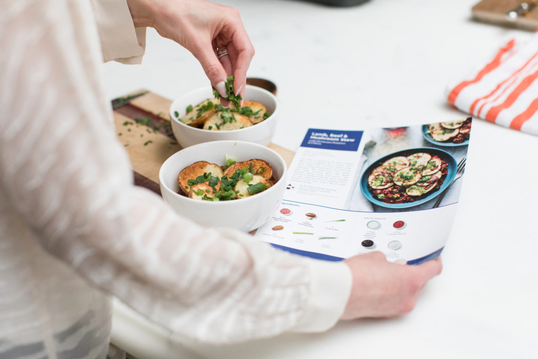 Eva Amurri Martino puts the finishing touches on her Blue Apron lamb stew