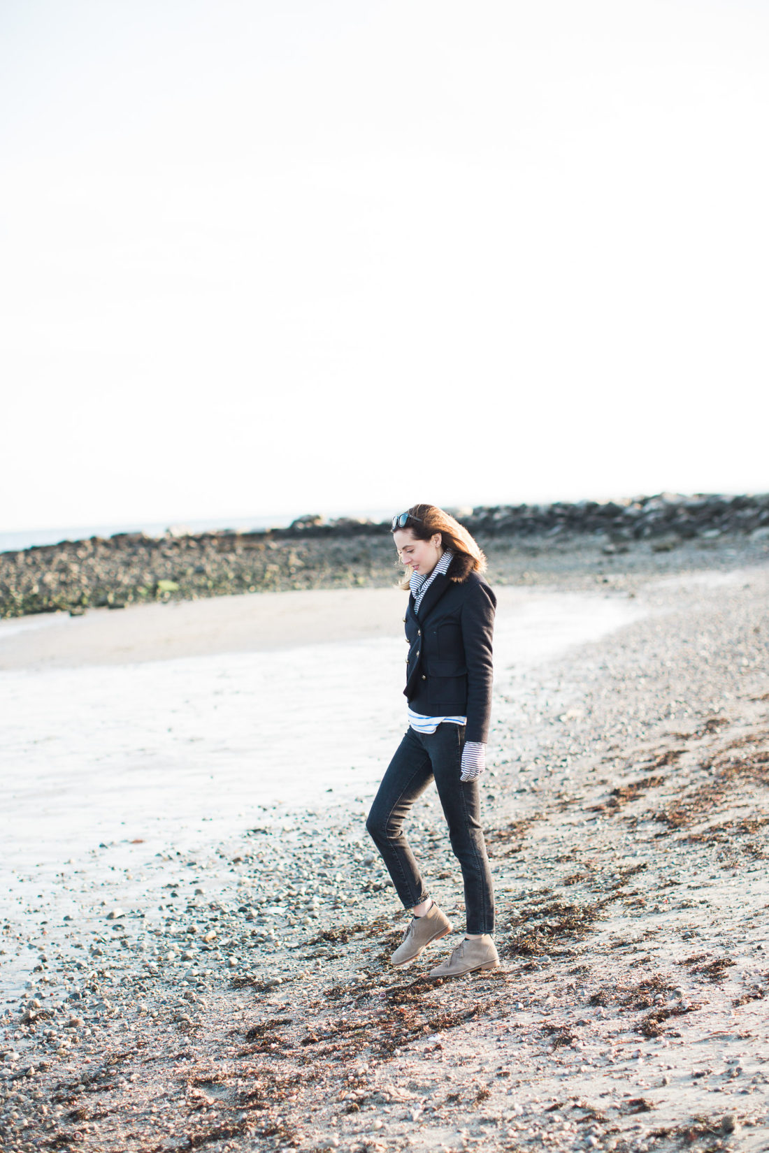 Eva Amurri Martino walks by the water at Compo Beach in Connecticut