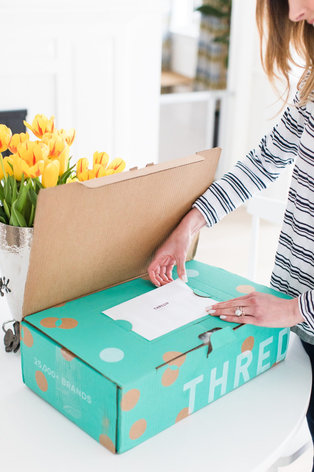 A detail of the cute polka dot packaging of the thredUP delivery box