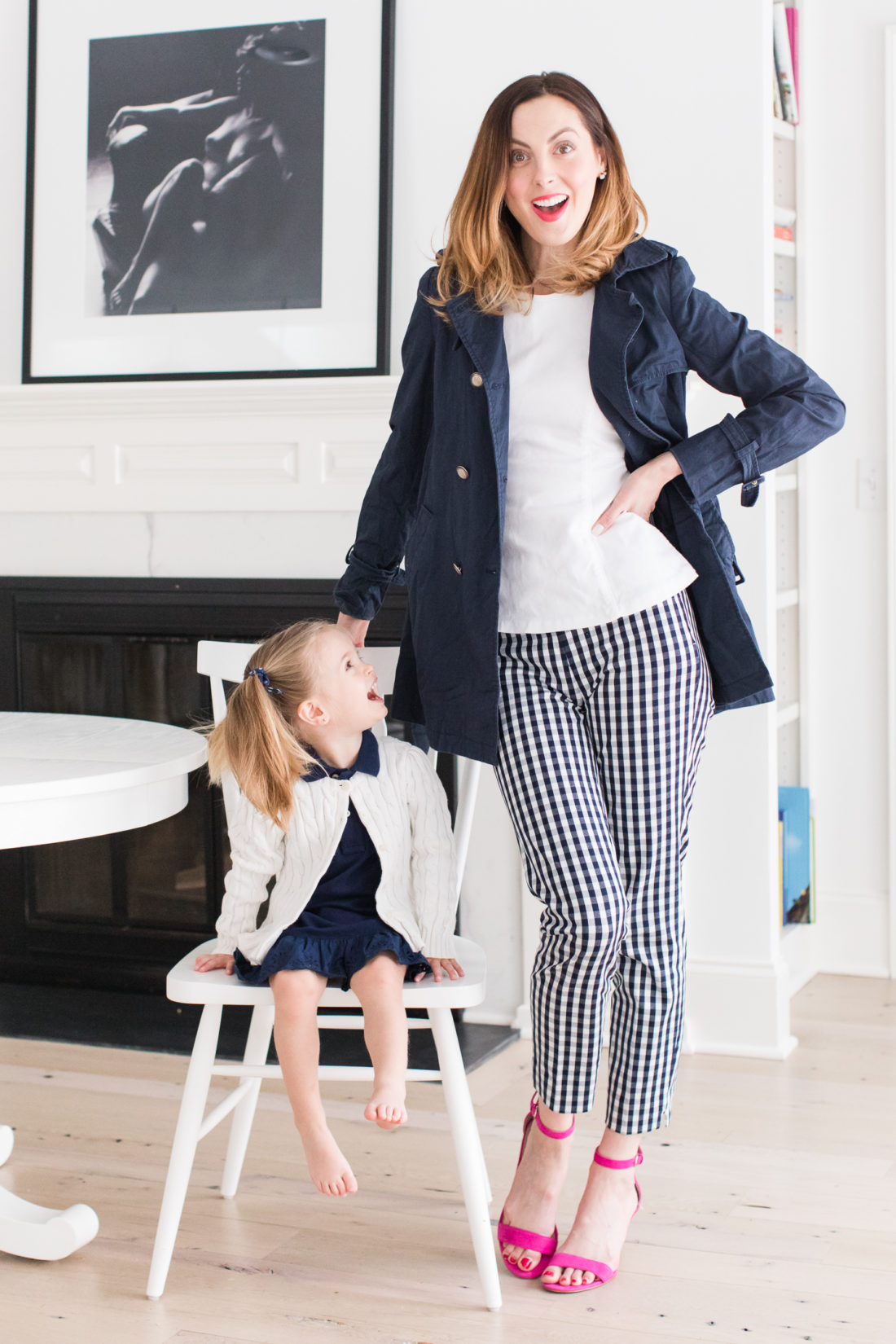 Eva Amurri Martino and Marlowe Martino wear their navy blue and white secondhand outfits from thredUP in the kitchen of their connecticut home