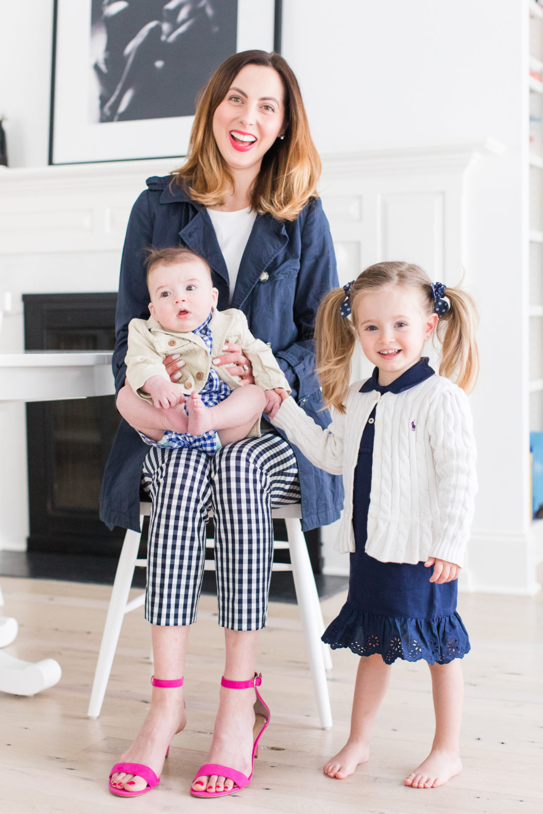 Eva Amurri Martino of lifestyle and motherhood blog Happily Eva After, sits in the kitchen of her Connecticut home with two year old daughter Marlowe and five month old son Major