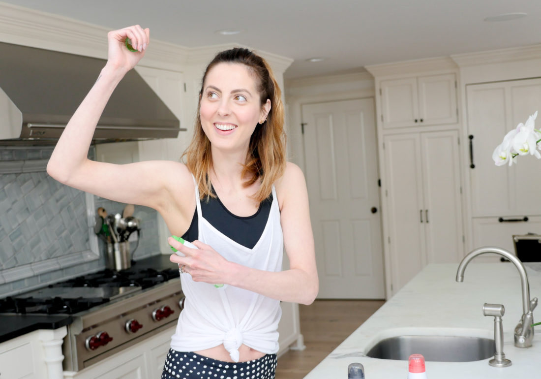 Eva Amurri Martino sprays the new JASON dry spray deodorant before heading out to her workout