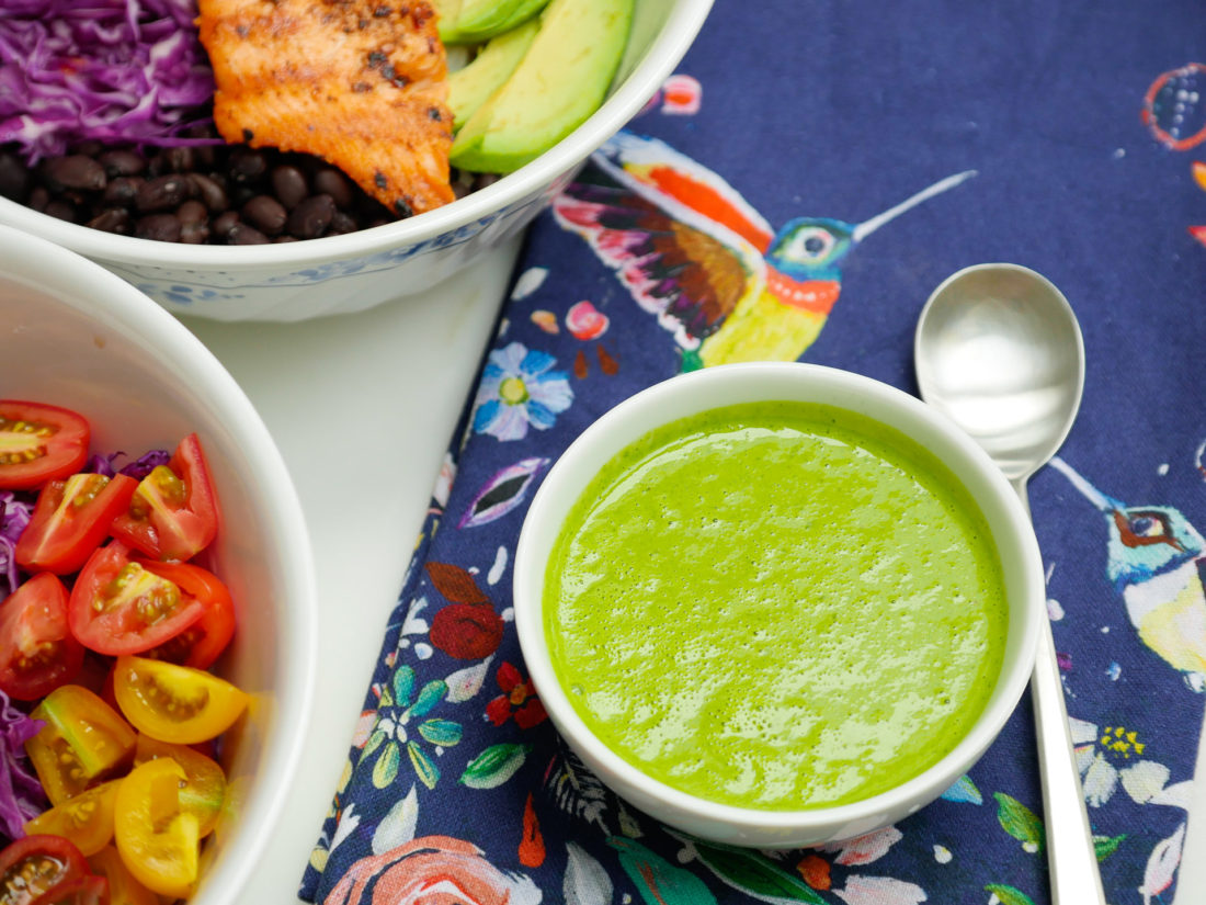 A close up view of the bright green Cilantro Lime Vinaigrette