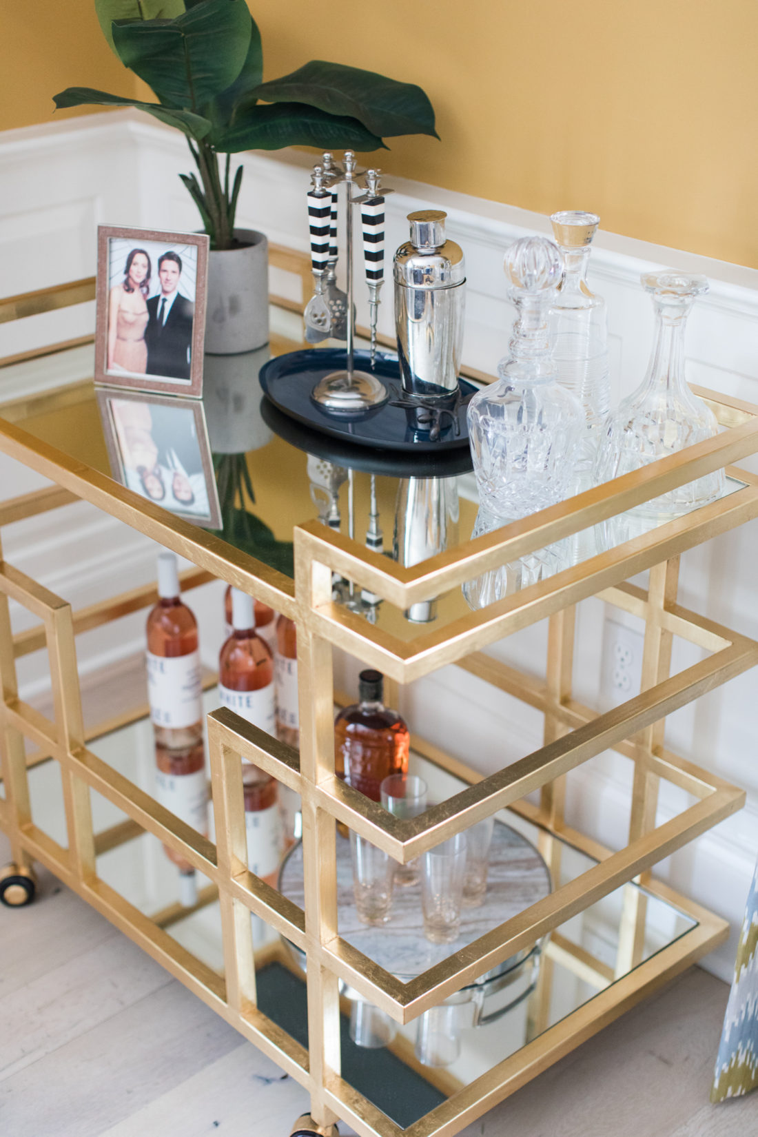 The golden deco bar cart in the formal living room of Eva Amurri martino's Connecticut home