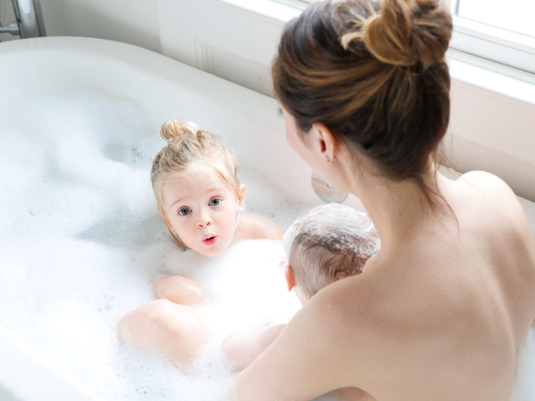 Marlowe Martino takes a bath with her Mom and baby brother