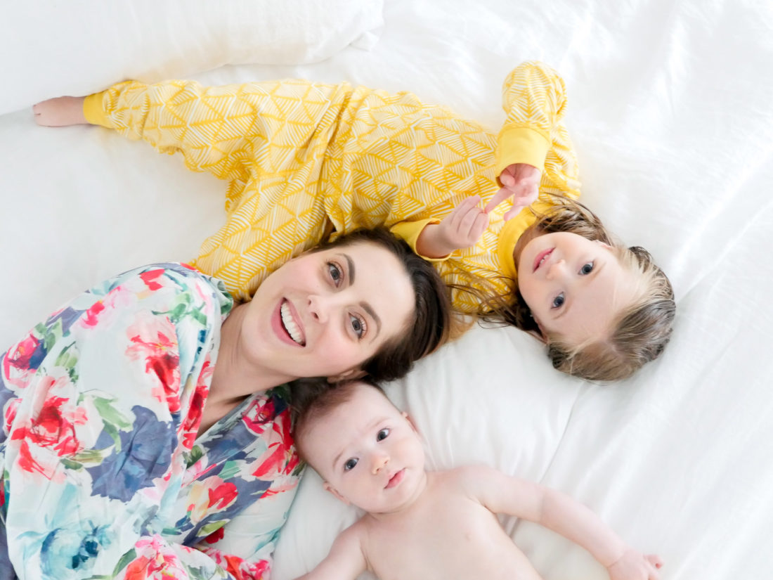 Eva Amurri Martino wears a floral bathrobe and snuggles with her two children before bed