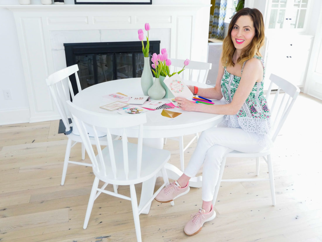 Eva Amurri Martino sits at her kitchen table to fill out a collection of Hallmark Signature Mother's Day cards
