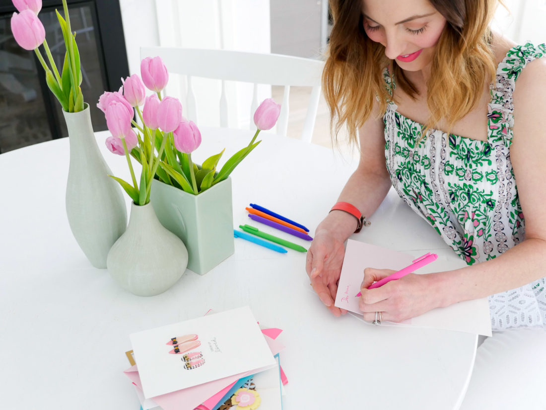Eva Amurri Martino writes a personal message in the Hallmark Signature card she selected to gift her Mom on Mother's Day