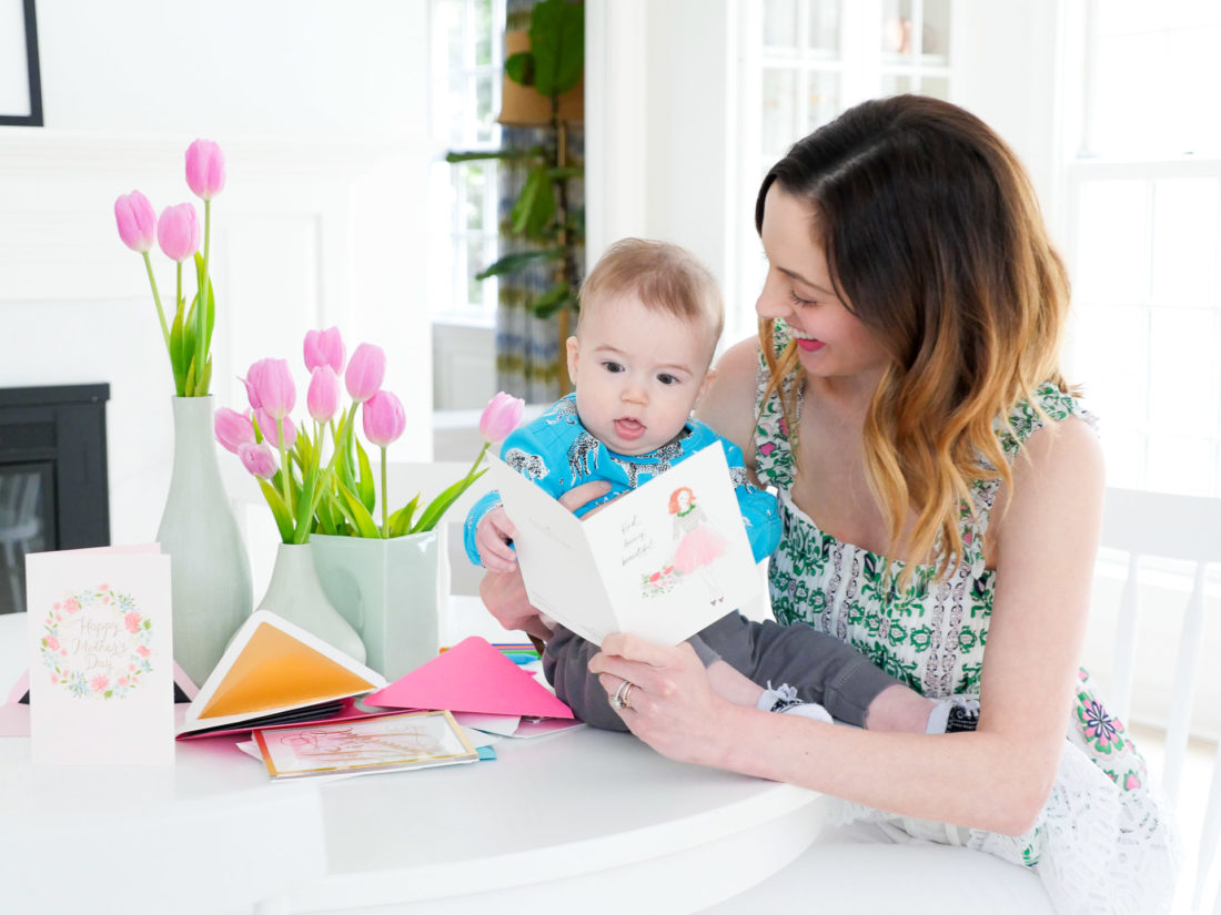 Eva Amurri Martino and her six month old son, Major Martino, look at Hallmark Signature Mother's Day Cards at the kitchen table of their Connecticut home