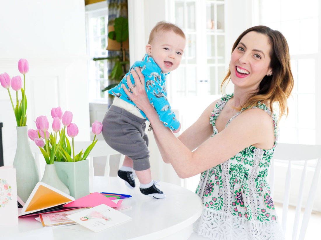 Eva Amurri Martino lifts her six month old son, Major Martino, in to the air