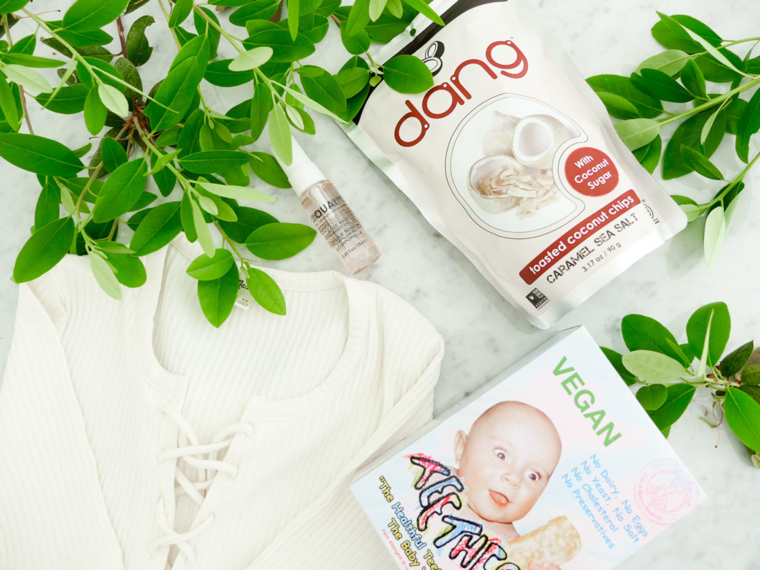 Eva Amurri Martino shares a roundup of her monthly obsessions for June, including a package of teething biscuits, coconut chips, a rose hair oil, and a lace up bodysuit