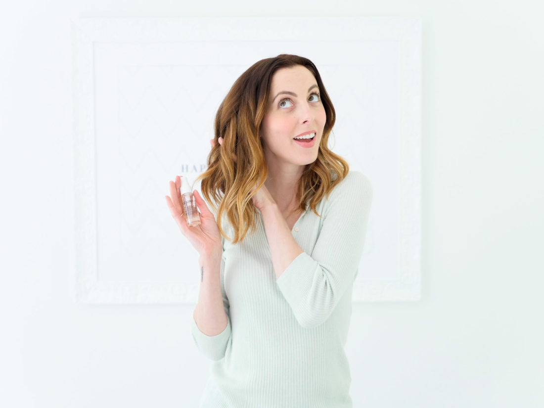 Eva Amurri Martino applies Ouai rose hair and body oil as part of her monthly obsessions