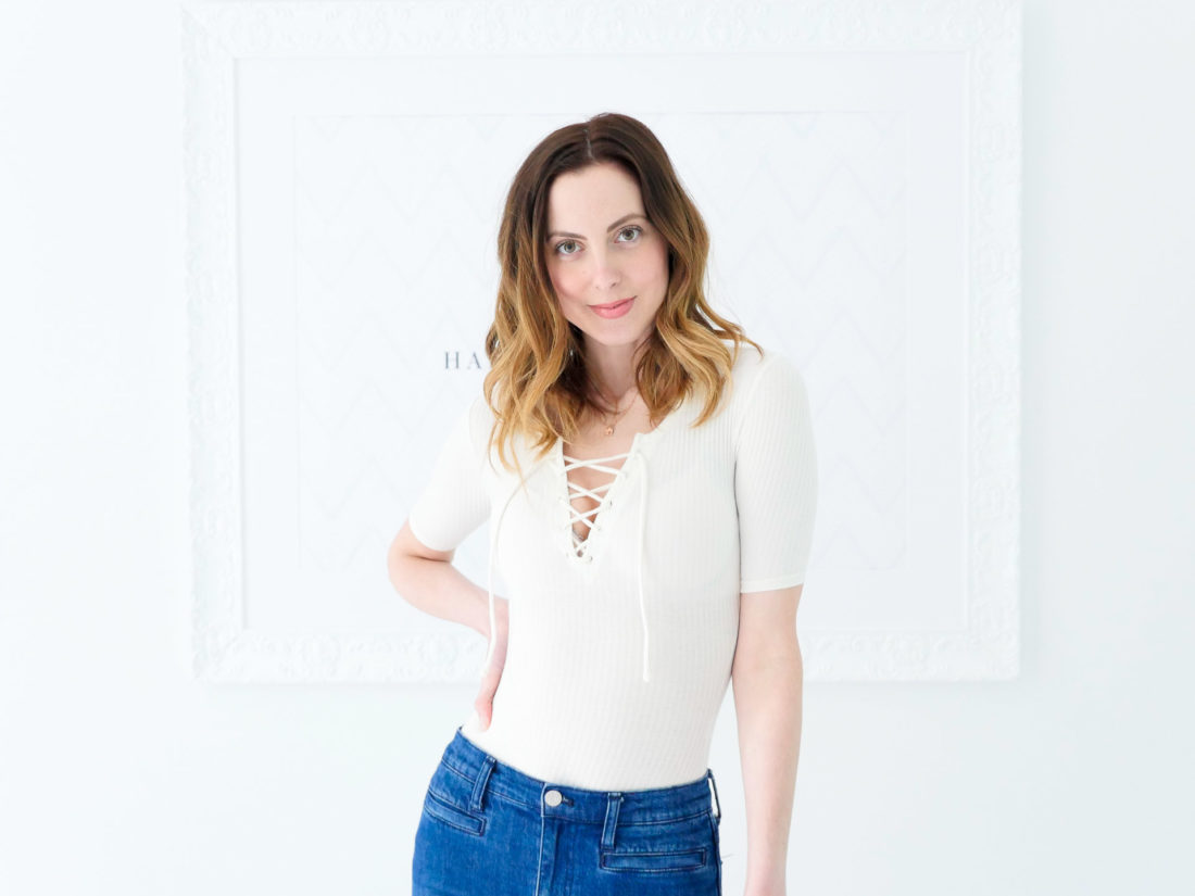 Eva Amurri Martino wears an off-white lace up Madewell body suit as part of her monthly obsessions roundup