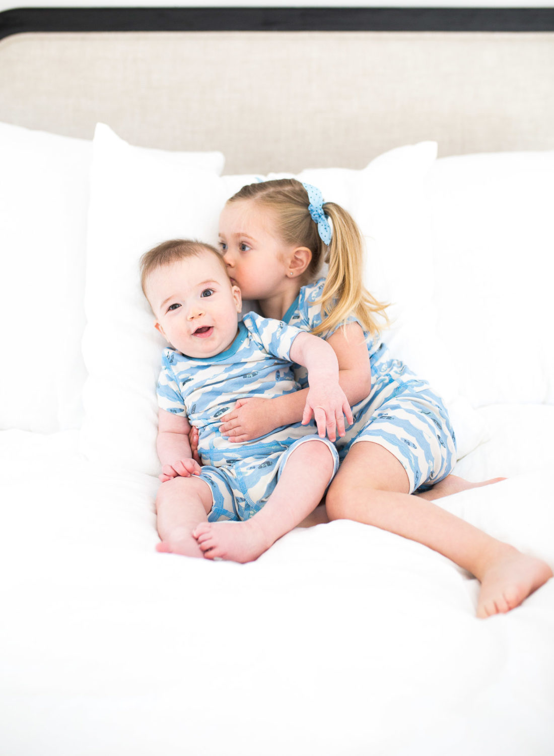 Marlowe Martino hugs her little brother Major in matching pajamas